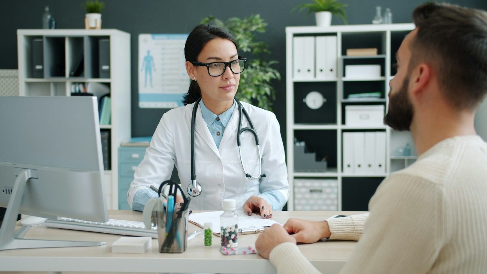 Specialist doctor with an international patient in India